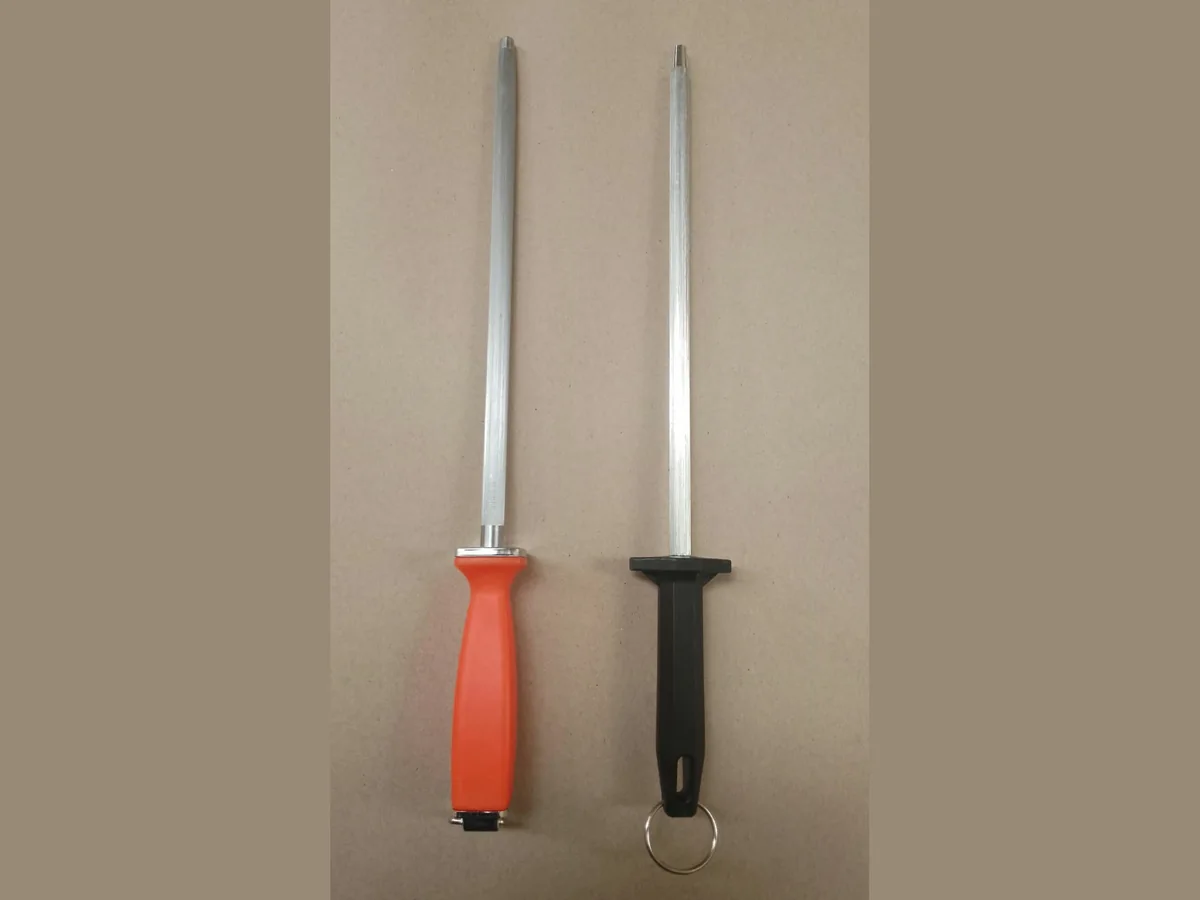 Big Steel Two large knife sharpening steels with orange and black handles