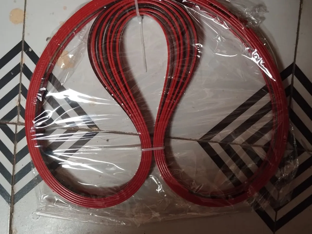 1650 Blue/Red Blade Coiled red-coated band saw blade sealed in its packaging