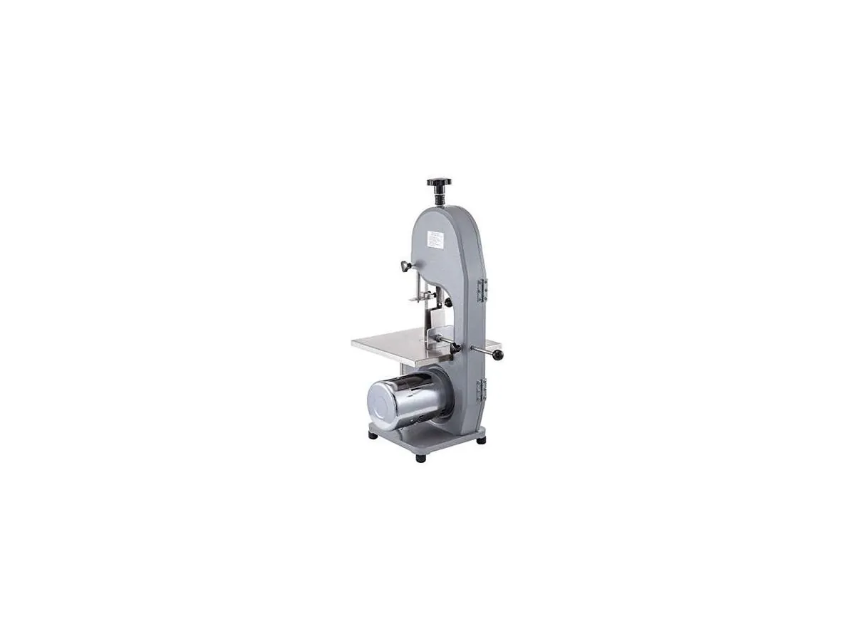 Compact bone saw machine seen from the side, showing the blade guard and tension knob Compact bone saw machine seen from the side, showing the blade guard and tension knob